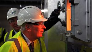 HRH Duke of Gloucester viewing the waste burning in the grate