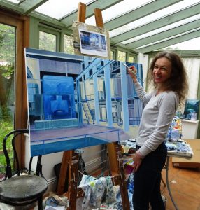 Sarah Moncrieff at work in her studio, putting the finishing touches to her painting of the Greatmoor turbine hall